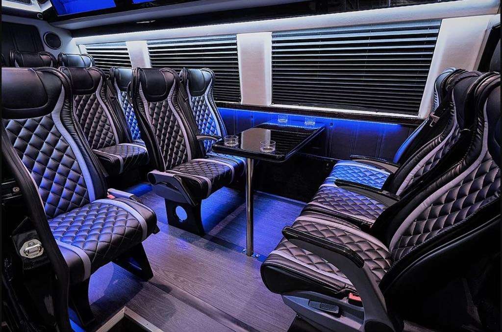 Luxurious black leather bus interior with modern design