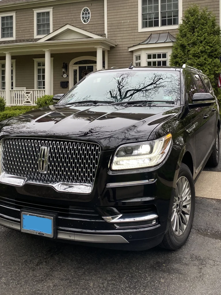 Kildeer Limo Service - Black SUV parked in suburban driveway