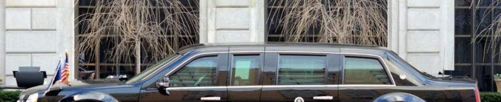 Are There Electric Limousines? - Black limousine parked near building exterior.