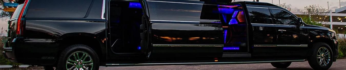 Can I Hire a Limousine for a One-Way Trip? - Luxurious black limousine with open doors and lights.