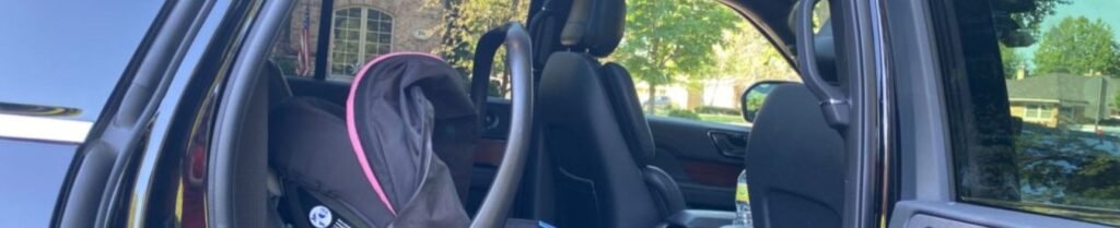Do I Need a Car Seat in a Limousine? - Car with child seat inside, door open