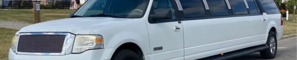 Charge by the Hour or by Distance? - White stretch limousine parked on roadside.