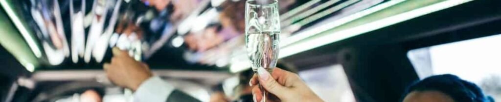 Do Limo Services Include Drinks or Refreshments? - Toast with champagne in limousine party