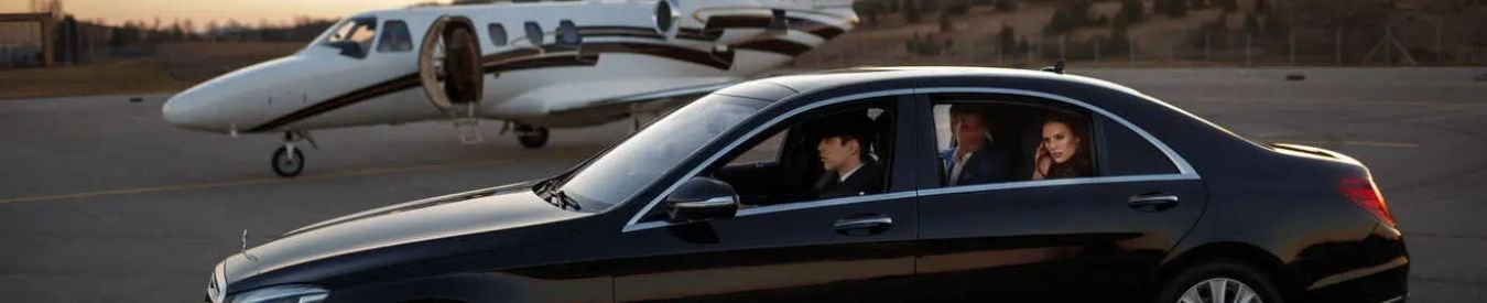 Do Limousine Services Operate 24/7? - Luxury car near private jet on tarmac