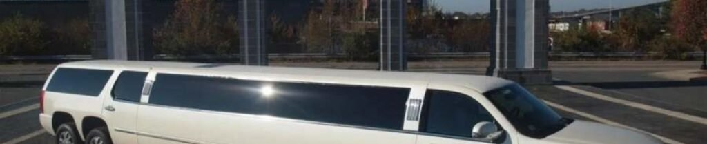 Choose a Good Limo Service - White stretch limousine in urban setting