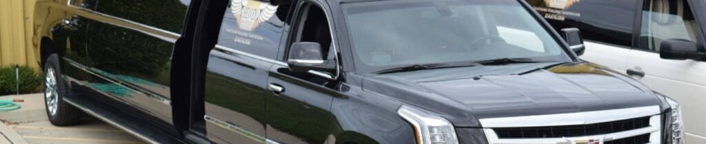 Prom Limo Cost - Black stretch limousine parked outside building
