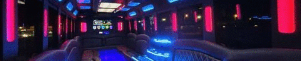 Should I Rent a Limo or a Party Bus for Prom? - Interior of luxury party bus with neon lights.