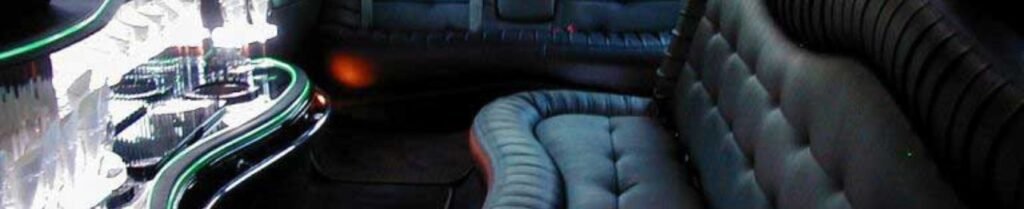 What is a stretch limousine? - Luxurious limousine interior with seating and bar