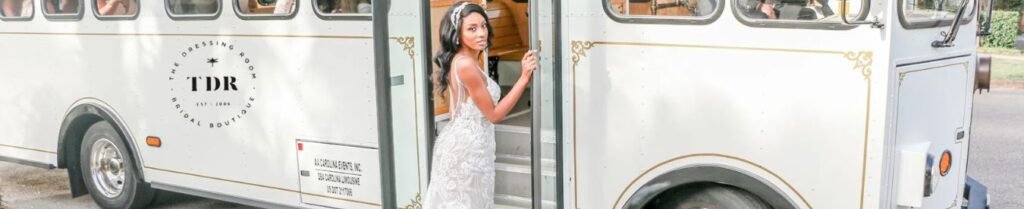 What is the Best Way to Transport Wedding Guests? - Bride boarding vintage white bus.